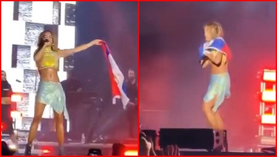 RITA ORA SE OGRNULA SRPSKOM ZASTAVOM Trobojka oko vrata pjevačice albanskog porijekla (VIDEO)