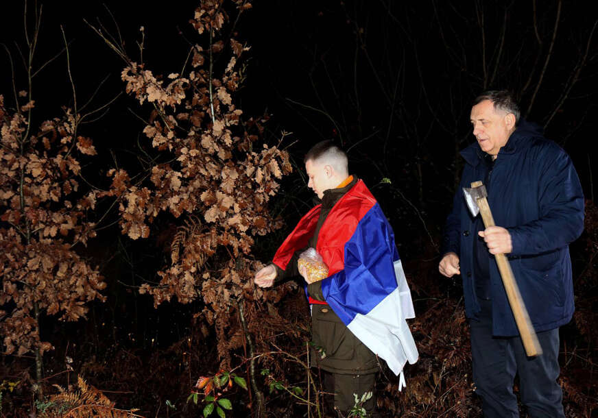 DODIK ISPOŠTOVAO TRADICIJU Predsjednik Srpske sa unukom usjekao badnjak (FOTO/VIDEO)